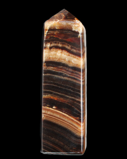 Chocolate Calcite obelisk 116*32mm 243g in sunlight - Rocks and Things Store