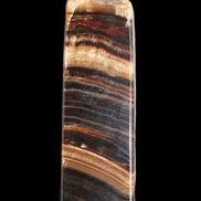 Chocolate Calcite obelisk 116*32mm 243g in sunlight - Rocks and Things Store