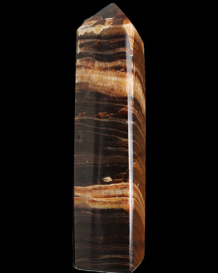 Chocolate Calcite obelisk 116*32mm 243g in sunlight - Rocks and Things Store