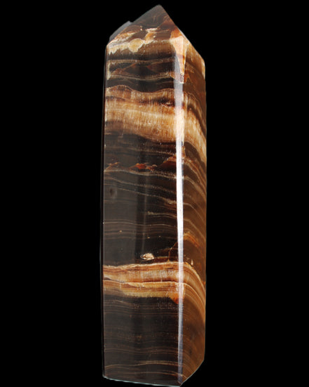 Chocolate Calcite obelisk 116*32mm 243g in sunlight - Rocks and Things Store