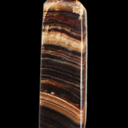 Chocolate Calcite obelisk 116*32mm 243g in sunlight - Rocks and Things Store