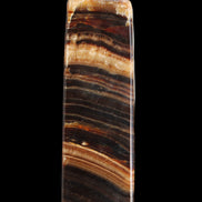 Chocolate Calcite obelisk 116*32mm 243g in sunlight - Rocks and Things Store