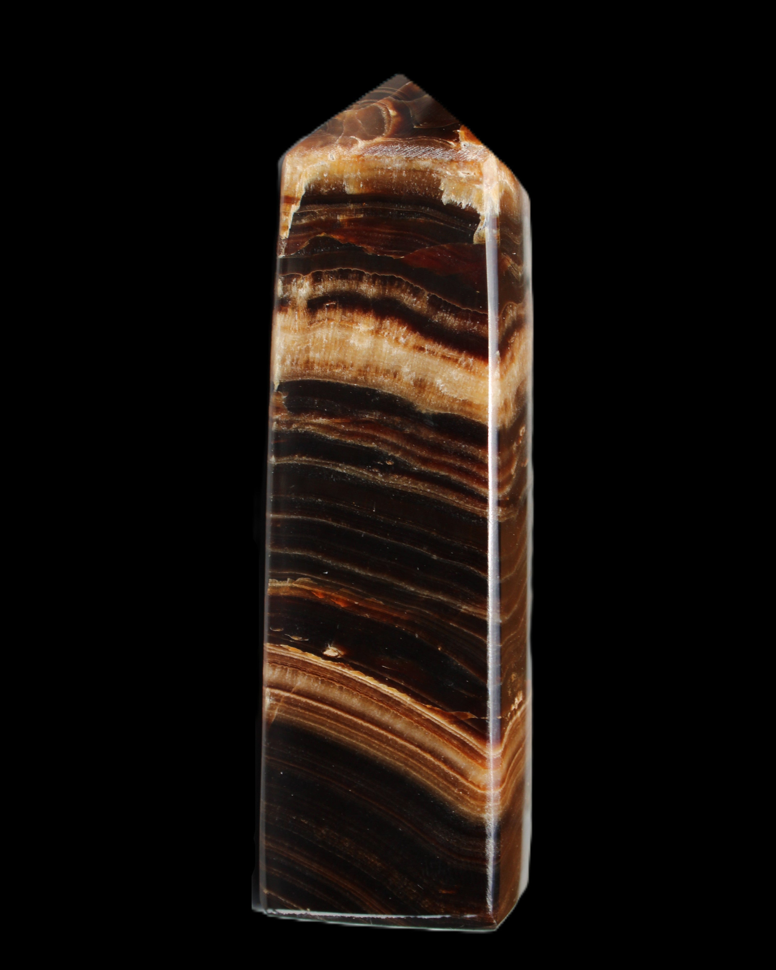 Chocolate Calcite obelisk 116*32mm 243g in sunlight - Rocks and Things Store