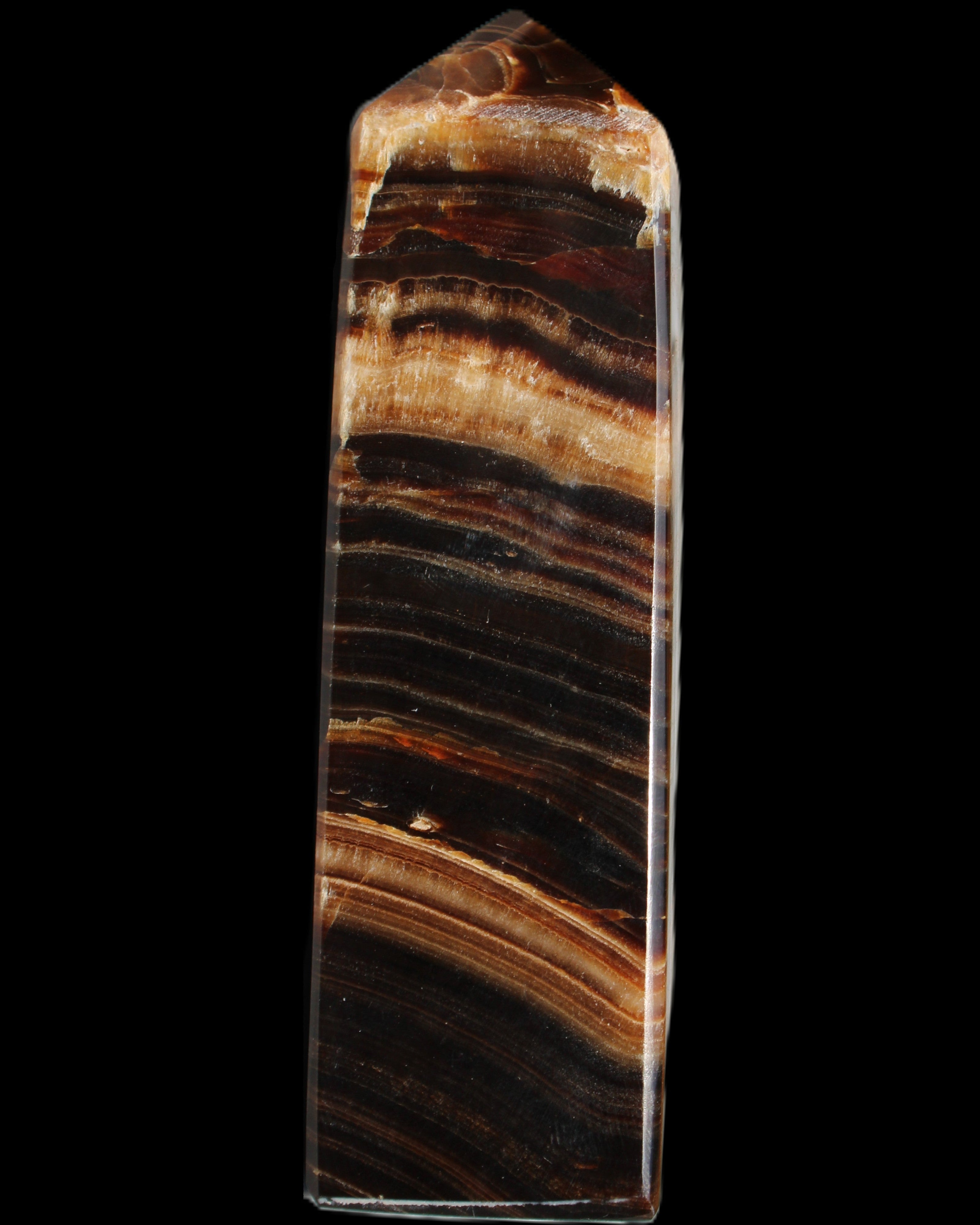 Chocolate Calcite obelisk 116*32mm 243g in sunlight - Rocks and Things Store