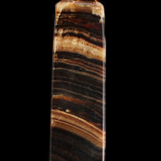 Chocolate Calcite obelisk 116*32mm 243g in sunlight - Rocks and Things Store