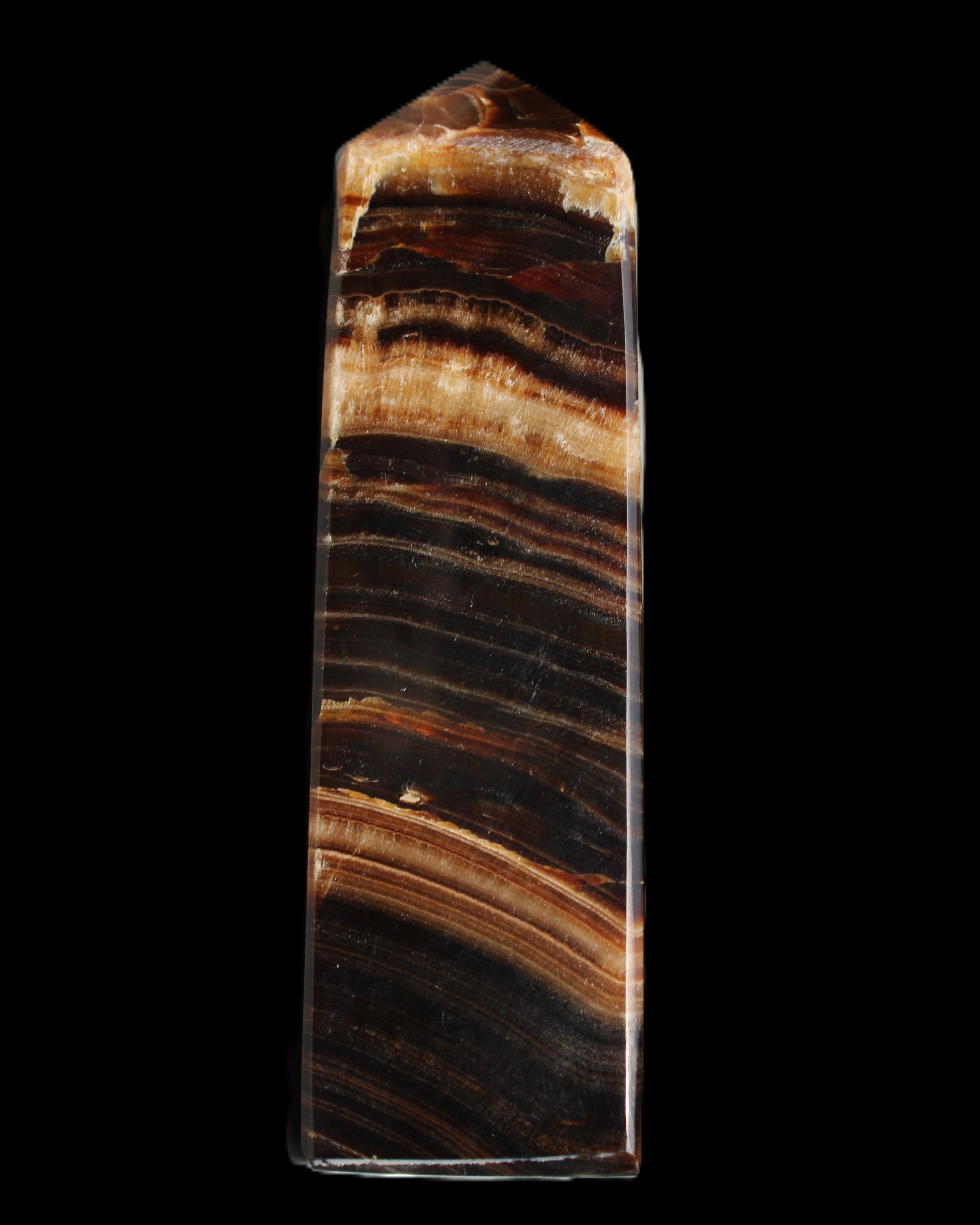 Chocolate Calcite obelisk 116*32mm 243g in sunlight - Rocks and Things Store