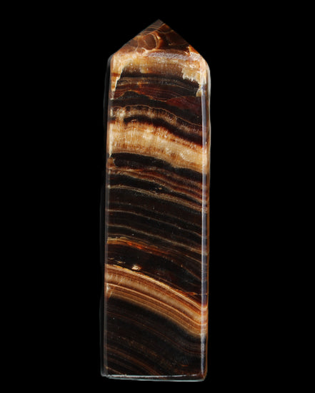 Chocolate Calcite obelisk 116*32mm 243g in sunlight - Rocks and Things Store