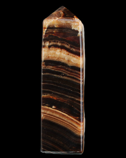 Chocolate Calcite obelisk 116*32mm 243g in sunlight - Rocks and Things Store