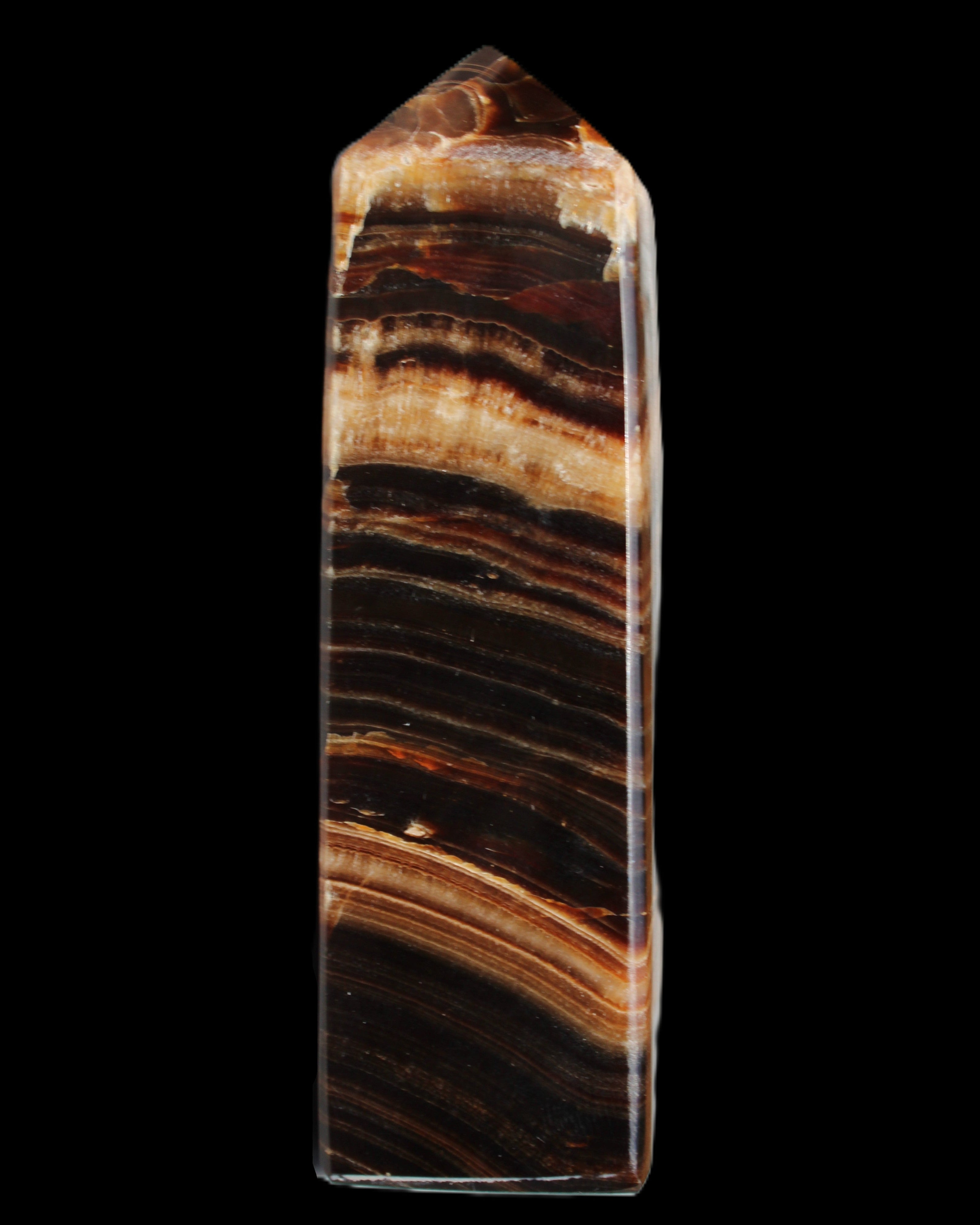 Chocolate Calcite obelisk 116*32mm 243g in sunlight - Rocks and Things Store