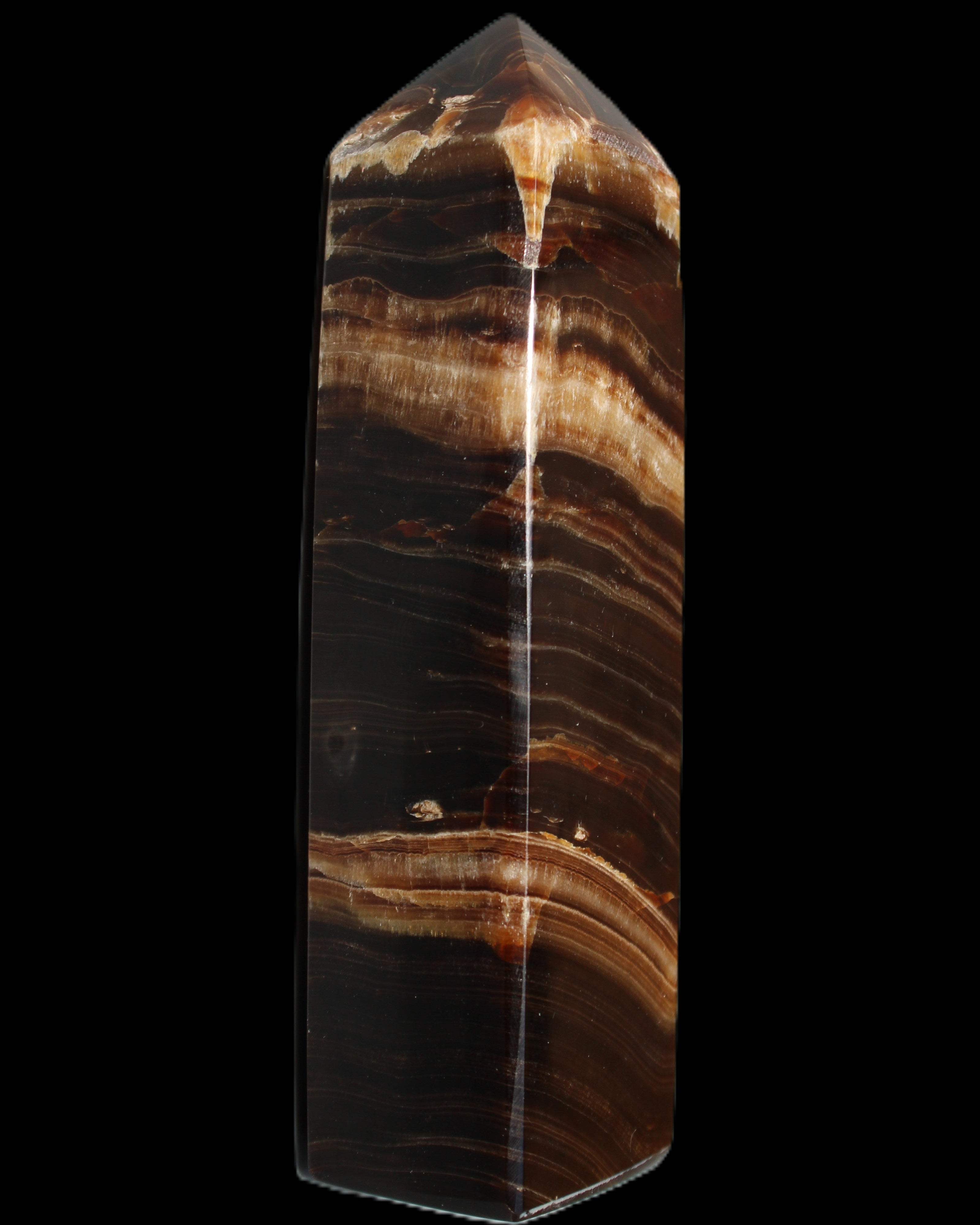 Chocolate Calcite obelisk 116*32mm 243g in sunlight - Rocks and Things Store
