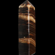 Chocolate Calcite obelisk 116*32mm 243g in sunlight - Rocks and Things Store