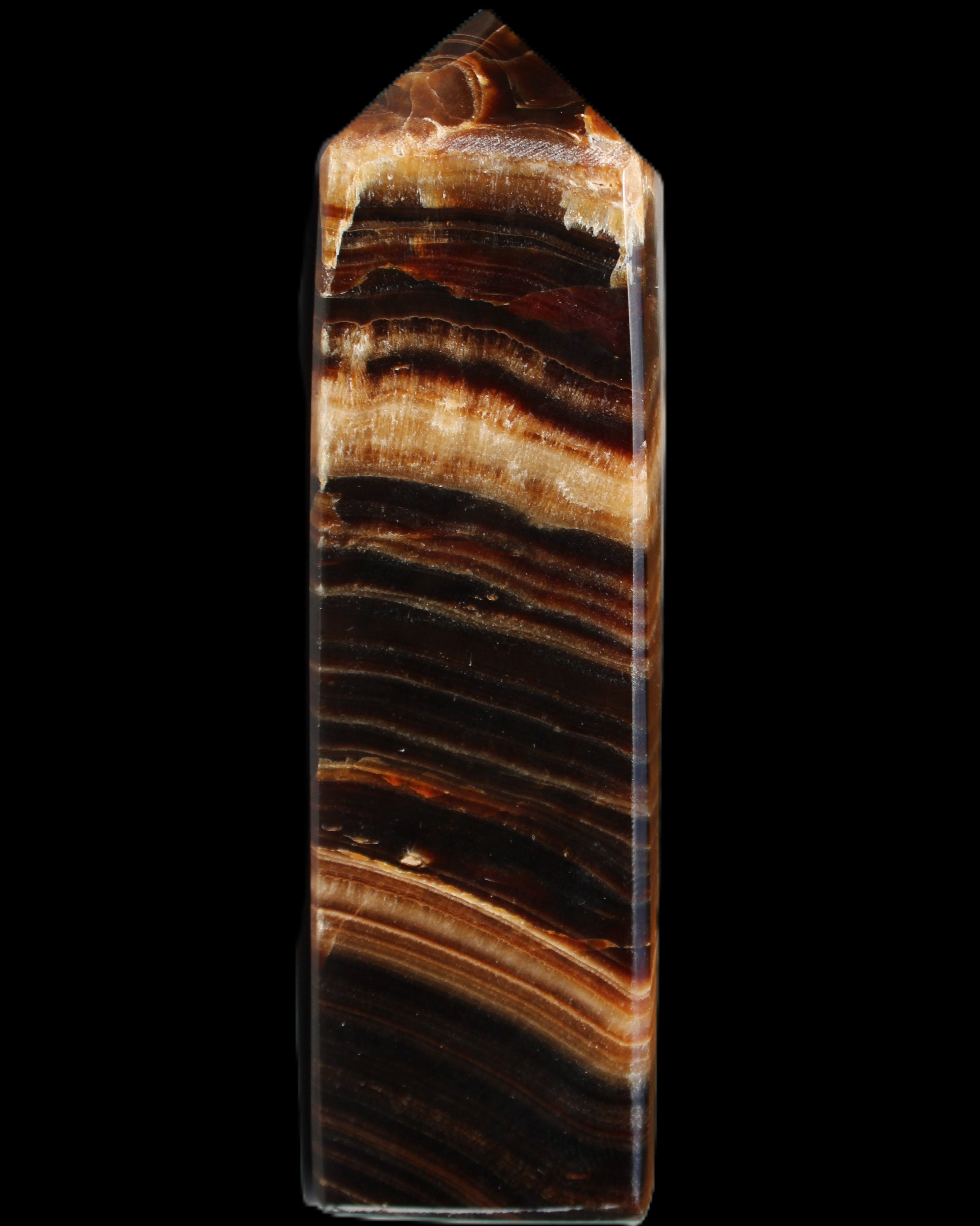 Chocolate Calcite obelisk 116*32mm 243g in sunlight - Rocks and Things Store