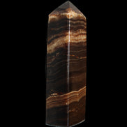 Chocolate Calcite obelisk 116*32mm 243g in sunlight - Rocks and Things Store