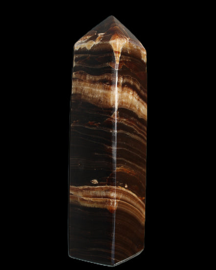 Chocolate Calcite obelisk 116*32mm 243g in sunlight - Rocks and Things Store