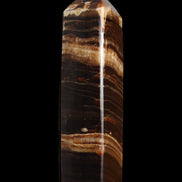 Chocolate Calcite obelisk 116*32mm 243g in sunlight - Rocks and Things Store