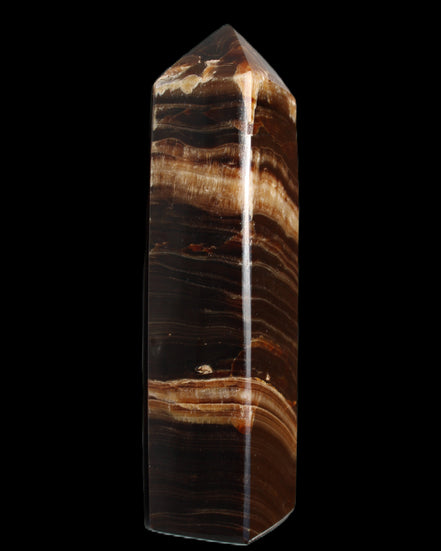 Chocolate Calcite obelisk 116*32mm 243g in sunlight - Rocks and Things Store