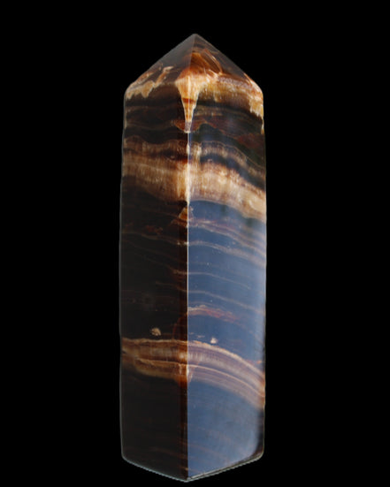 Chocolate Calcite obelisk 116*32mm 243g in sunlight - Rocks and Things Store
