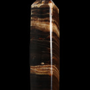 Chocolate Calcite obelisk 116*32mm 243g in sunlight - Rocks and Things Store