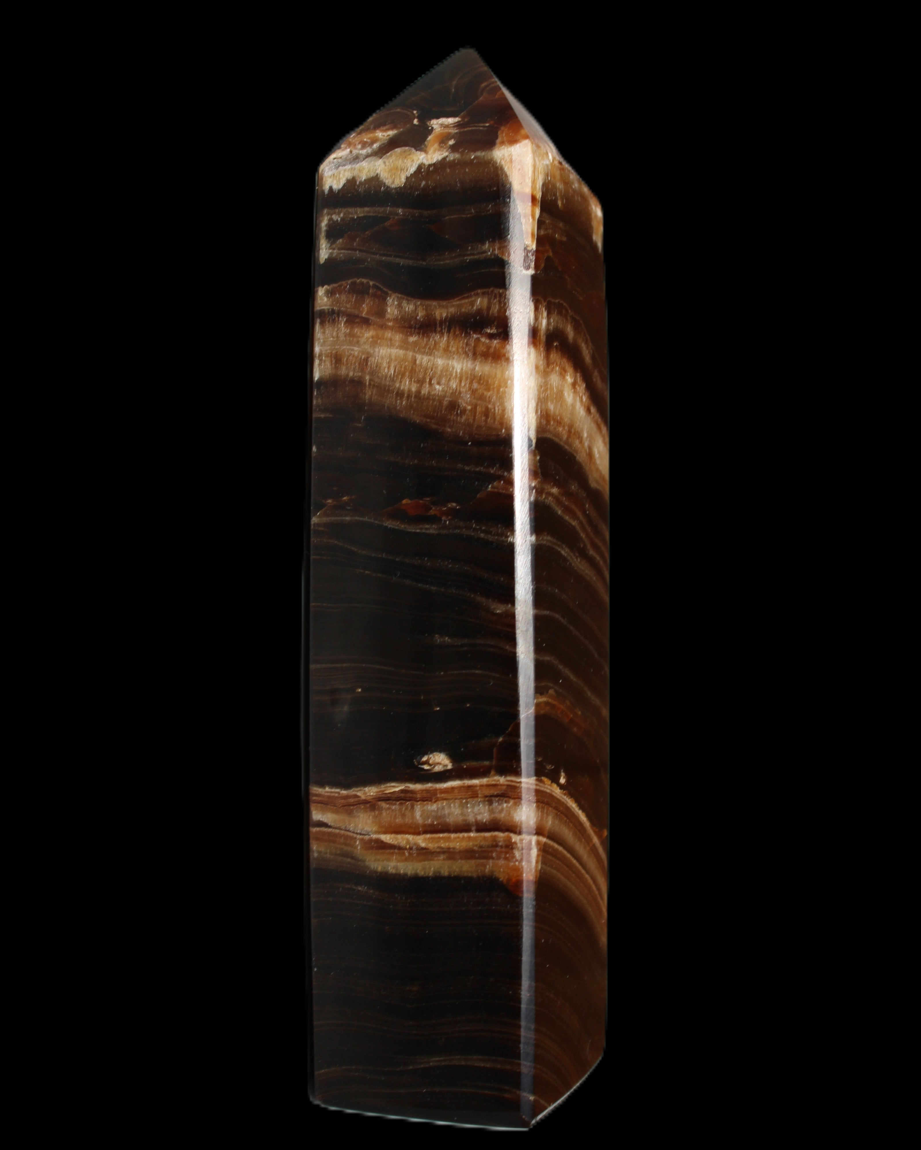 Chocolate Calcite obelisk 116*32mm 243g in sunlight - Rocks and Things Store