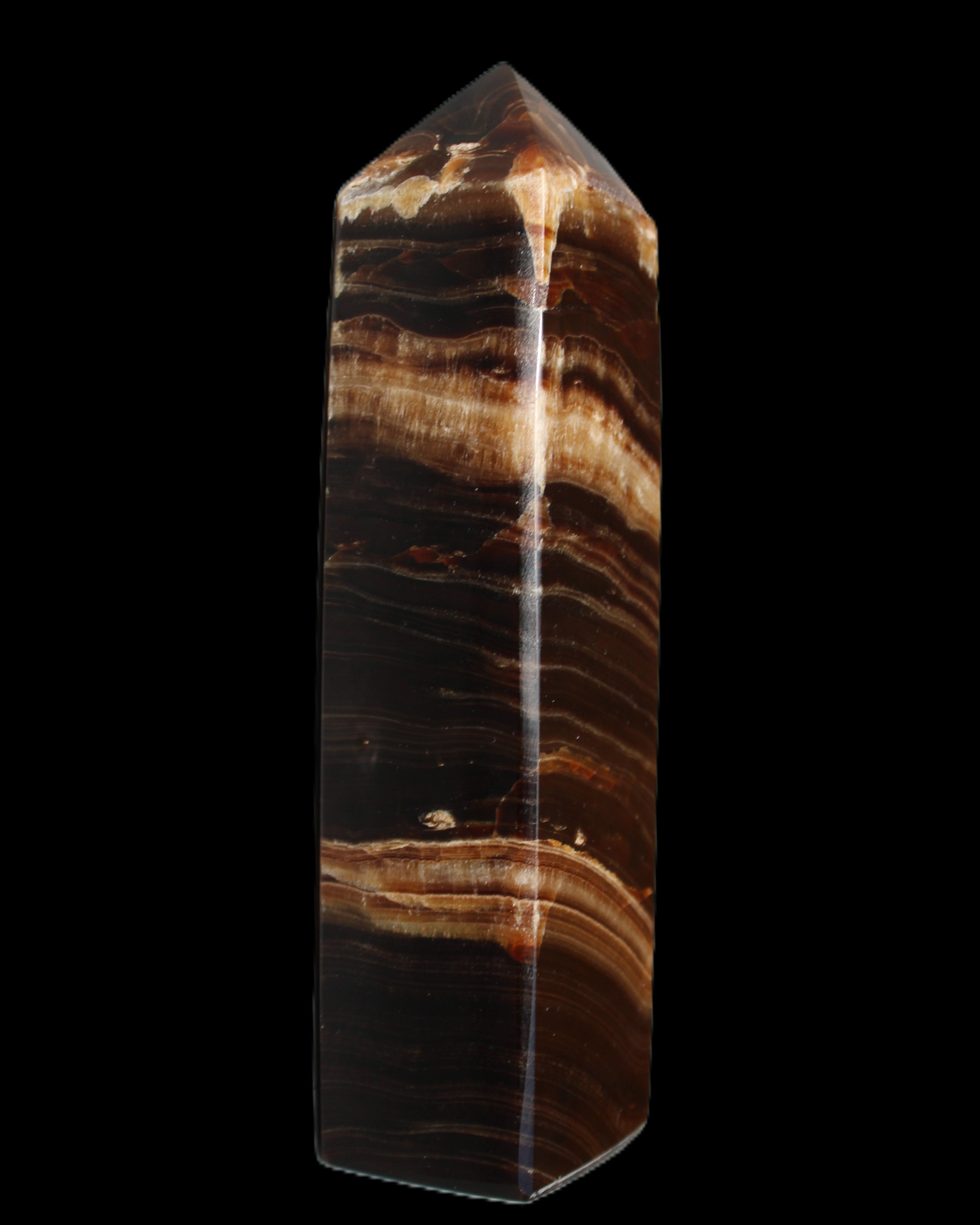 Chocolate Calcite obelisk 116*32mm 243g in sunlight - Rocks and Things Store