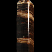 Chocolate Calcite obelisk 116*32mm 243g in sunlight - Rocks and Things Store