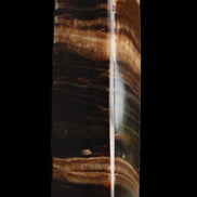 Chocolate Calcite obelisk 116*32mm 243g in sunlight - Rocks and Things Store