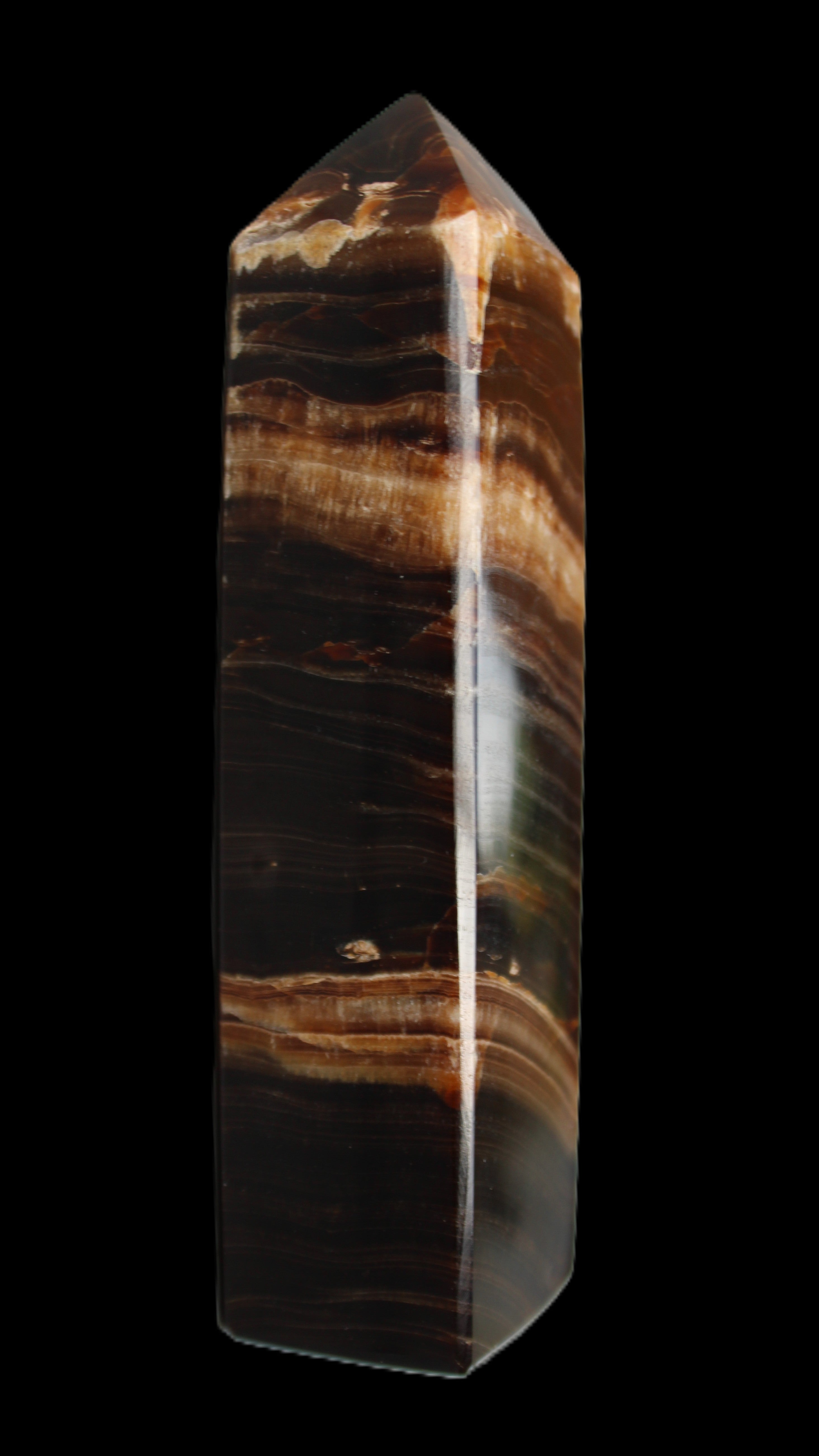 Chocolate Calcite obelisk 116*32mm 243g in sunlight - Rocks and Things Store