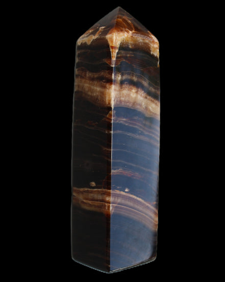 Chocolate Calcite obelisk 116*32mm 243g in sunlight - Rocks and Things Store