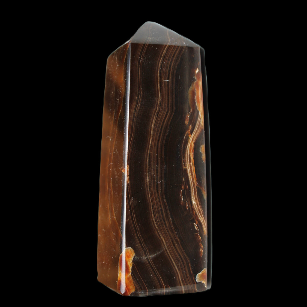 Chocolate Calcite obelisk 91*34mm 211g in sunlight - Rocks and Things Store