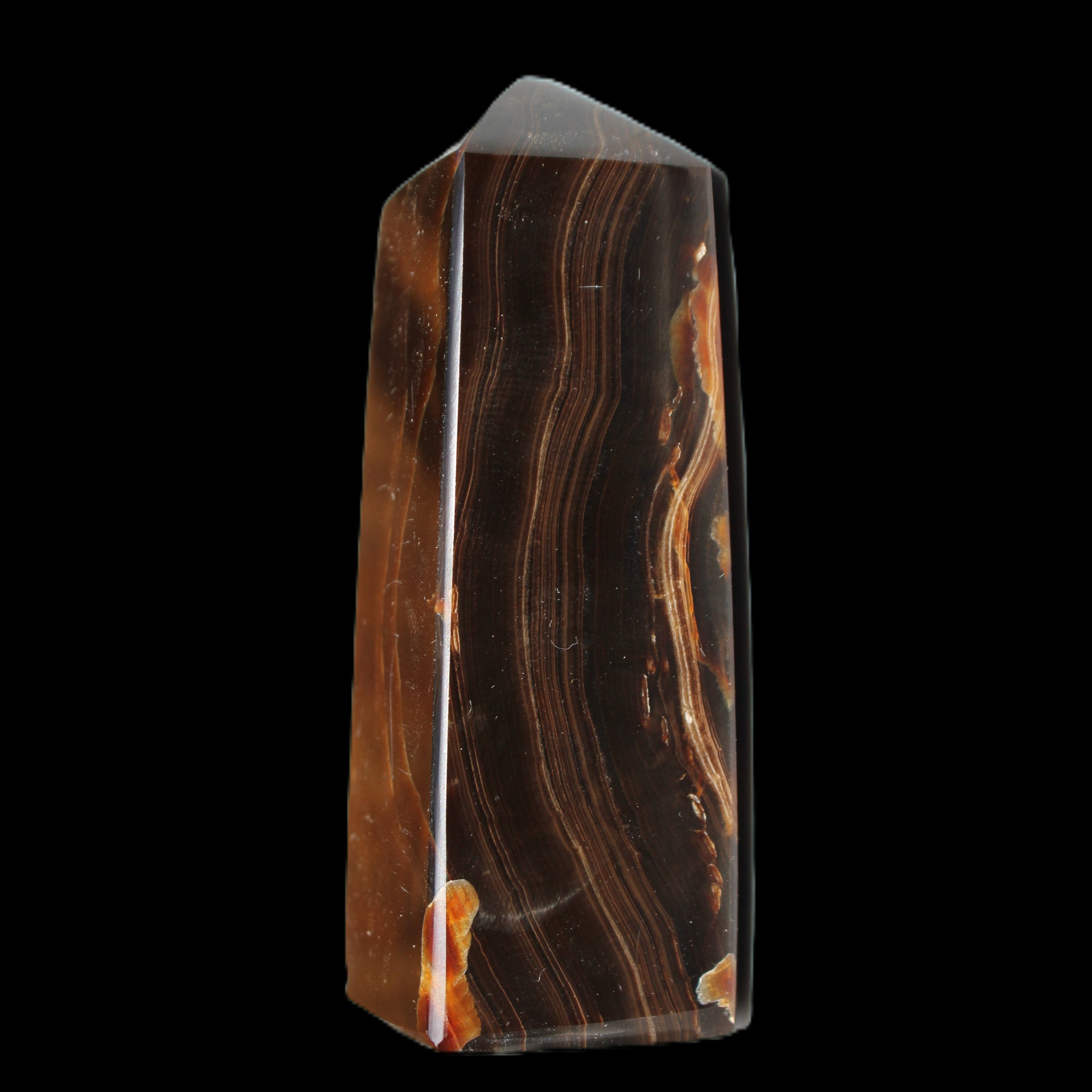 Chocolate Calcite obelisk 91*34mm 211g in sunlight - Rocks and Things Store