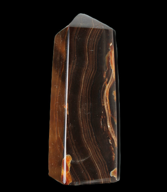 Chocolate Calcite obelisk 91*34mm 211g in sunlight - Rocks and Things Store