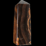 Chocolate Calcite obelisk 91*34mm 211g in sunlight - Rocks and Things Store