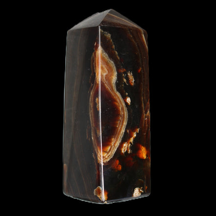 Chocolate Calcite obelisk 91*34mm 211g in sunlight - Rocks and Things Store