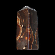 Chocolate Calcite obelisk 91*34mm 211g in sunlight - Rocks and Things Store