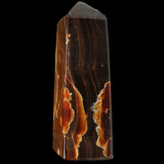 Chocolate Calcite obelisk 91*34mm 211g in sunlight - Rocks and Things Store