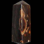 Chocolate Calcite obelisk 91*34mm 211g in sunlight - Rocks and Things Store