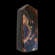 Chocolate Calcite obelisk 91*34mm 211g in sunlight - Rocks and Things Store