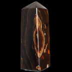 Chocolate Calcite obelisk 91*34mm 211g in sunlight - Rocks and Things Store