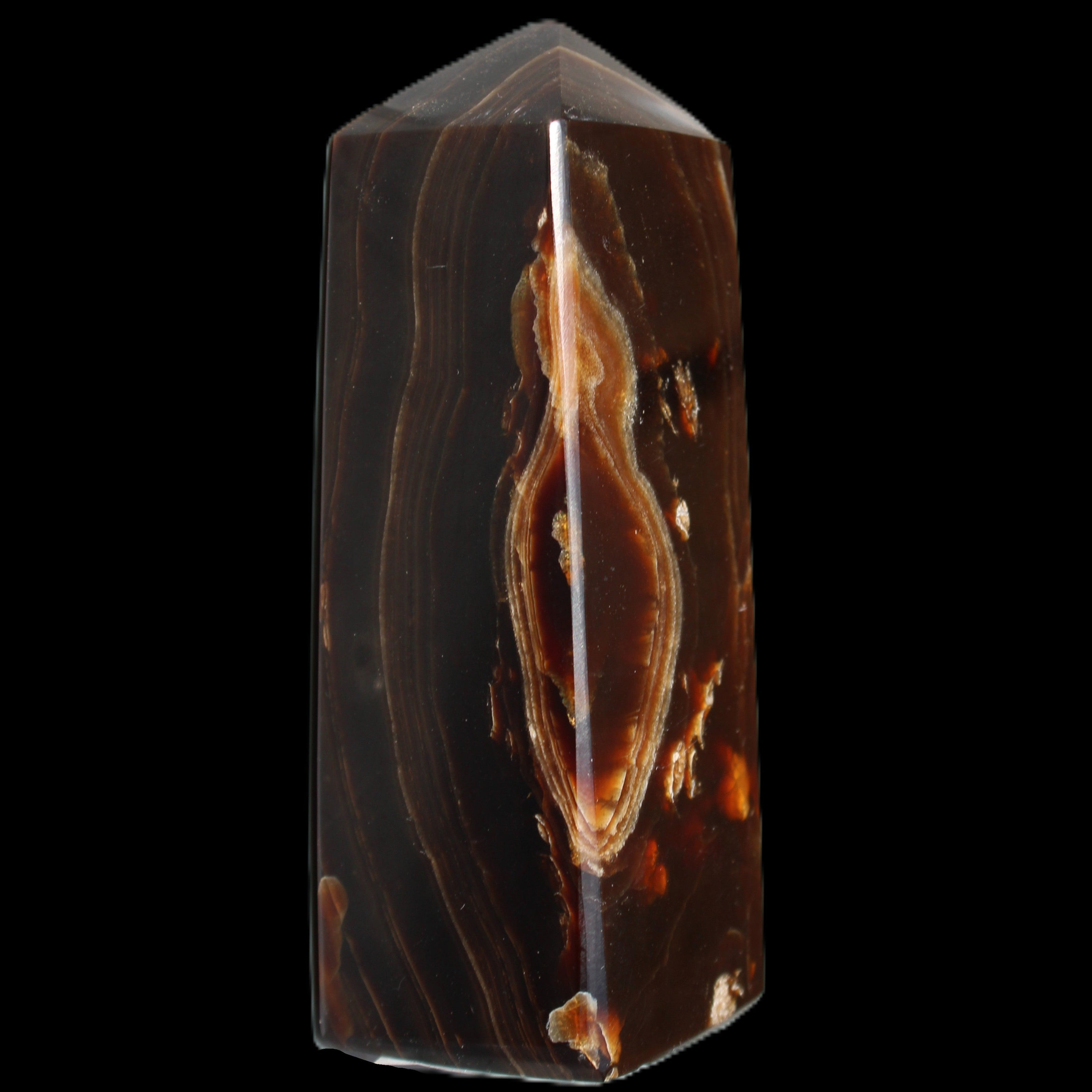 Chocolate Calcite obelisk 91*34mm 211g in sunlight - Rocks and Things Store