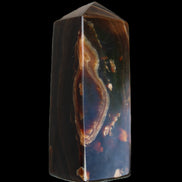 Chocolate Calcite obelisk 91*34mm 211g in sunlight - Rocks and Things Store