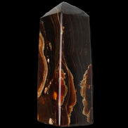 Chocolate Calcite obelisk 91*34mm 211g in sunlight - Rocks and Things Store