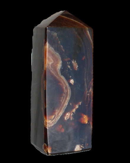 Chocolate Calcite obelisk 91*34mm 211g in sunlight - Rocks and Things Store