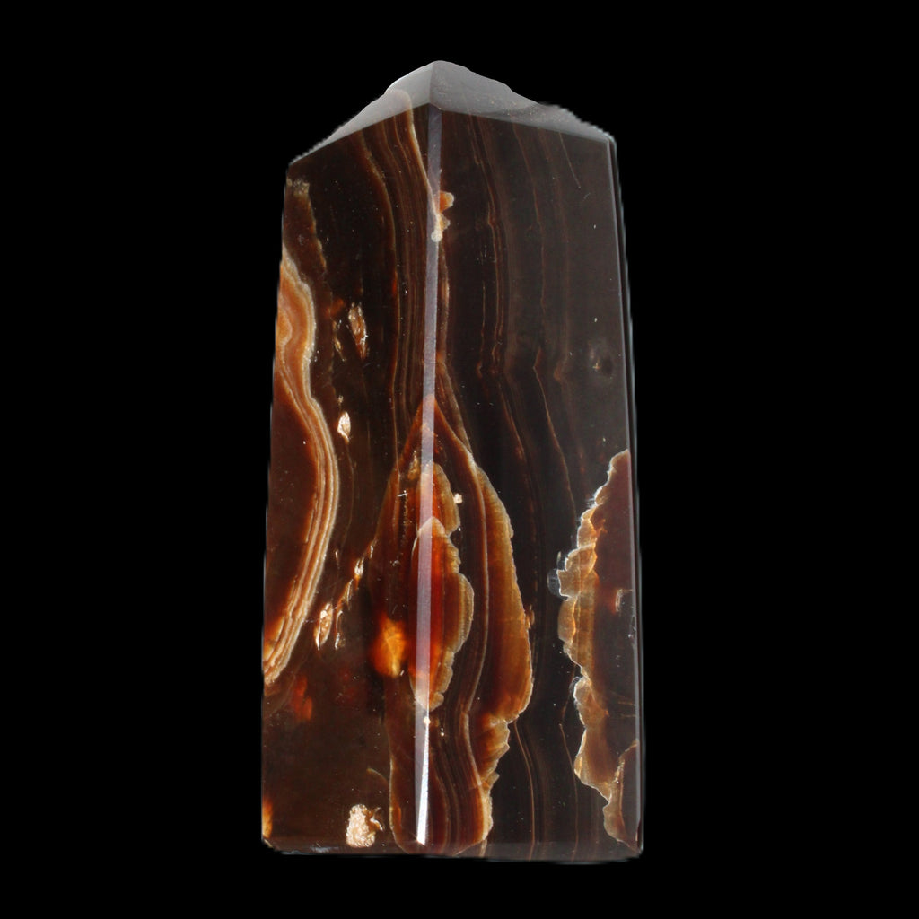 Chocolate Calcite obelisk 91*34mm 211g in sunlight - Rocks and Things Store