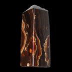 Chocolate Calcite obelisk 91*34mm 211g in sunlight - Rocks and Things Store