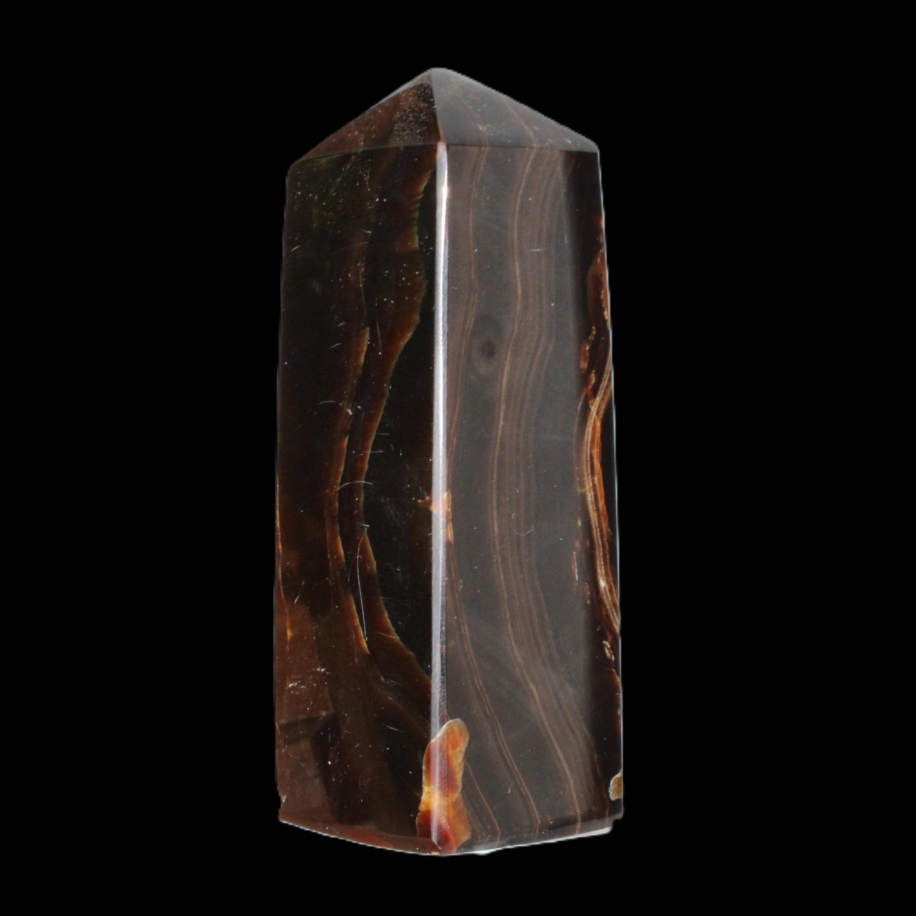 Chocolate Calcite obelisk 91*34mm 211g in sunlight - Rocks and Things Store