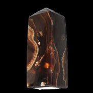 Chocolate Calcite obelisk 91*34mm 211g in sunlight - Rocks and Things Store