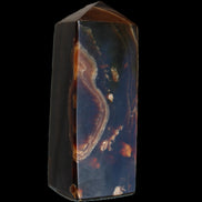 Chocolate Calcite obelisk 91*34mm 211g in sunlight - Rocks and Things Store