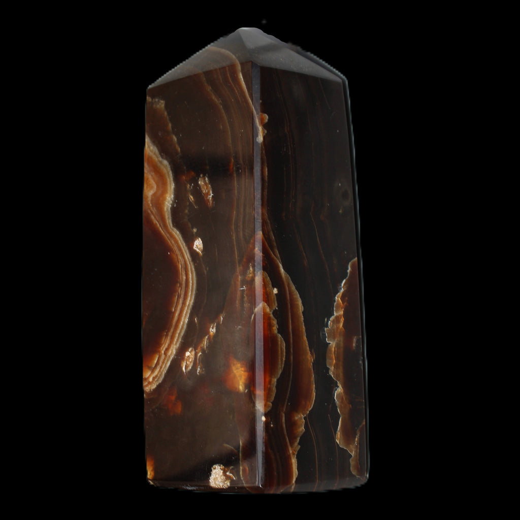 Chocolate Calcite obelisk 91*34mm 211g in sunlight - Rocks and Things Store