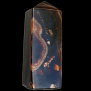 Chocolate Calcite obelisk 91*34mm 211g in sunlight - Rocks and Things Store