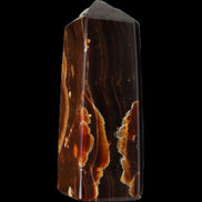 Chocolate Calcite obelisk 91*34mm 211g in sunlight - Rocks and Things Store